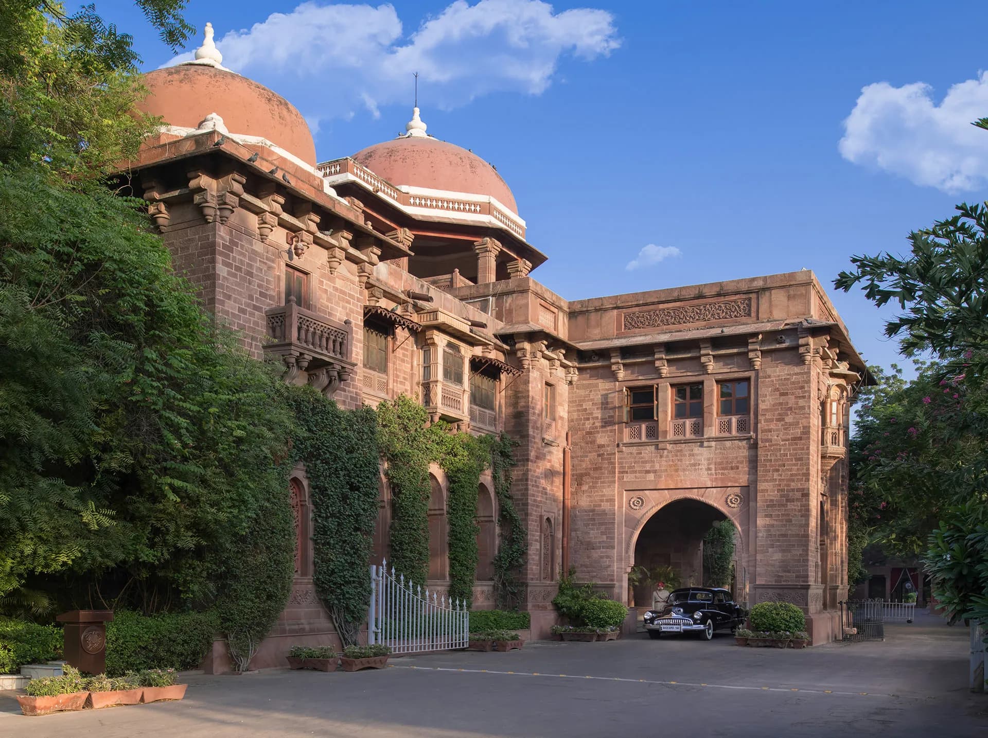 Heritage sandstone gateway and forecourt of Ajit Bhawan Palace in Jodhpur, Rajasthan