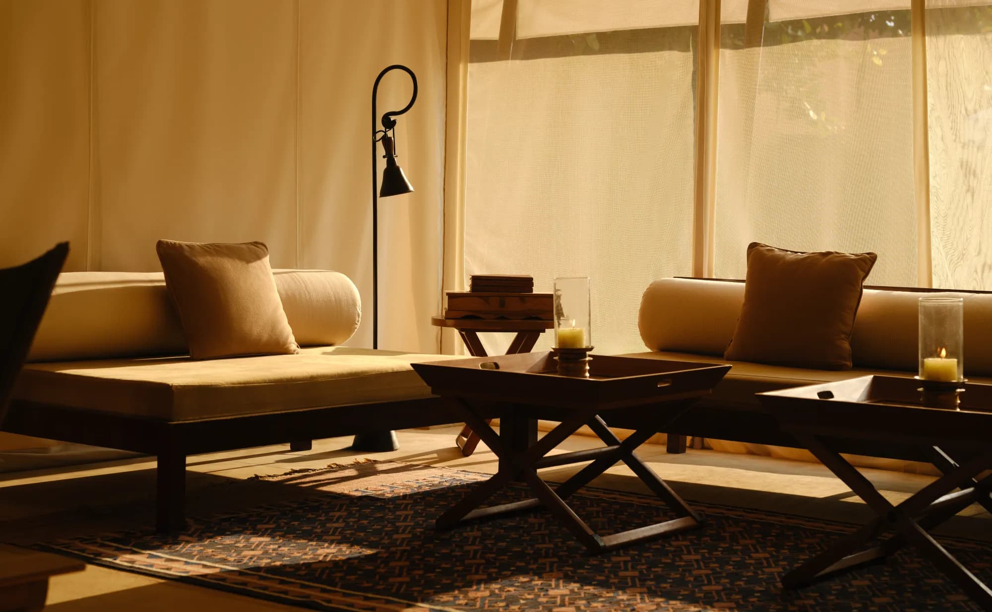Spacious tented pavilion living area in soft cream tones at Aman-i-Khas Ranthambore