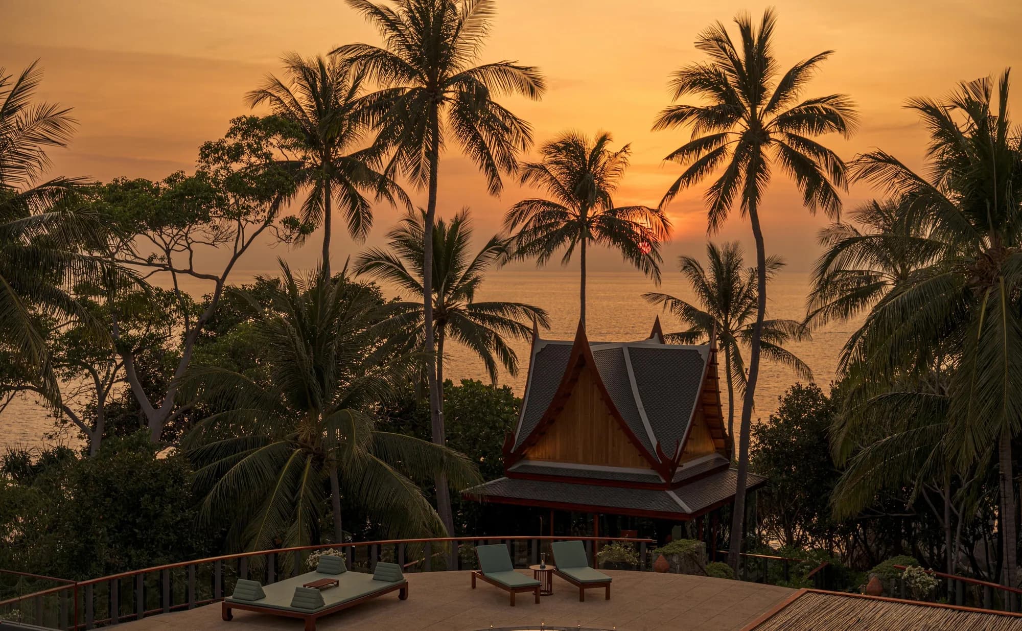 Ocean villa with private pool at golden hour on the headland at Amanpuri, Phuket