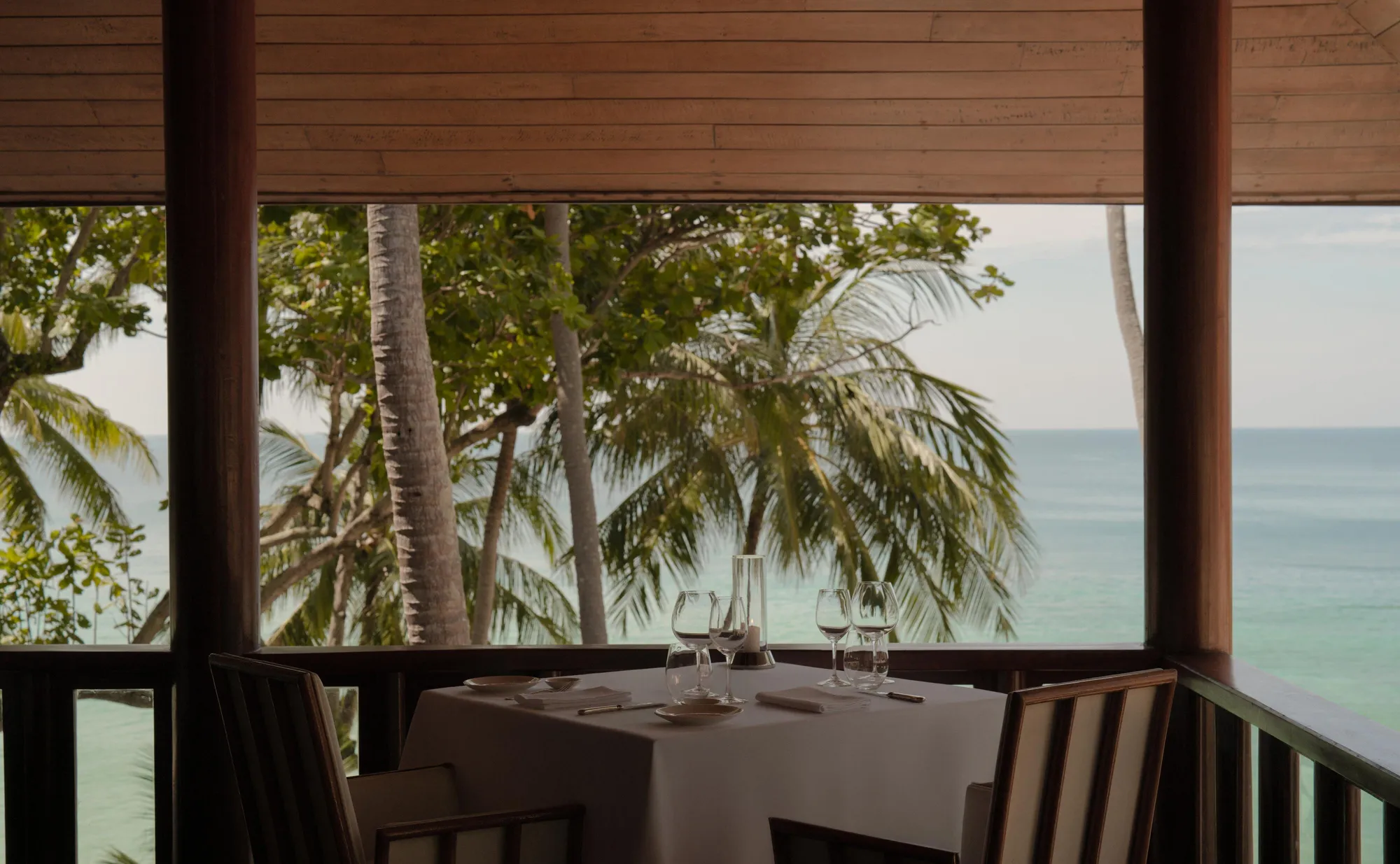 Arva restaurant interior fine-dining table setup at Amanpuri, Phuket