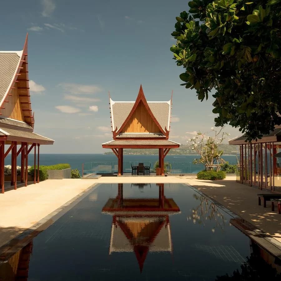 Amanpuri ocean villa terrace at sunset over the Andaman Sea, Phuket