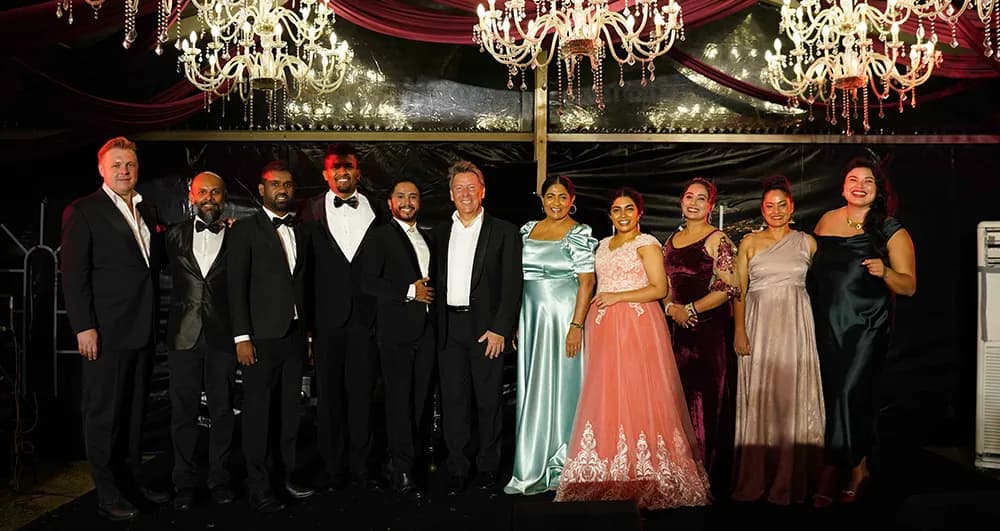 Crimson-draped marquee with chandeliers set for an evening celebration at Anantara Peace Haven Tangalle Sri Lanka