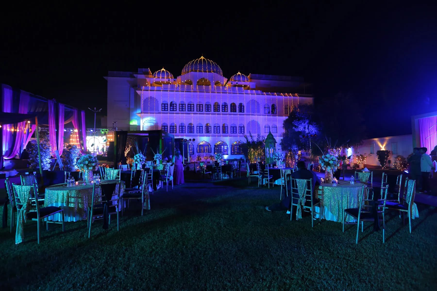 Evening sangeet celebration on the main banquet lawn at Anuraga Palace Ranthambore