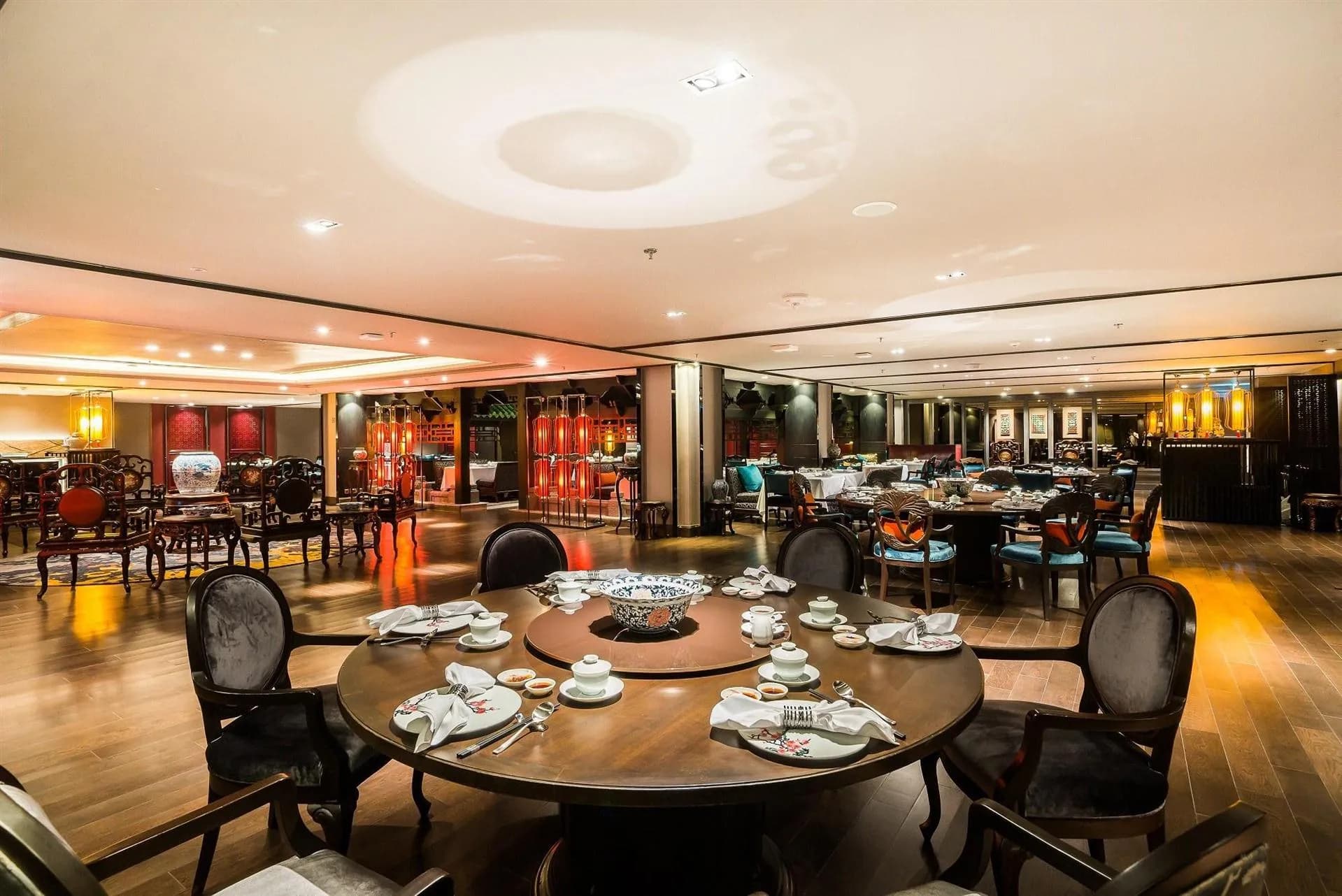 Large banquet dining hall set with round tables at Bangkok Marriott Marquis Queen's Park