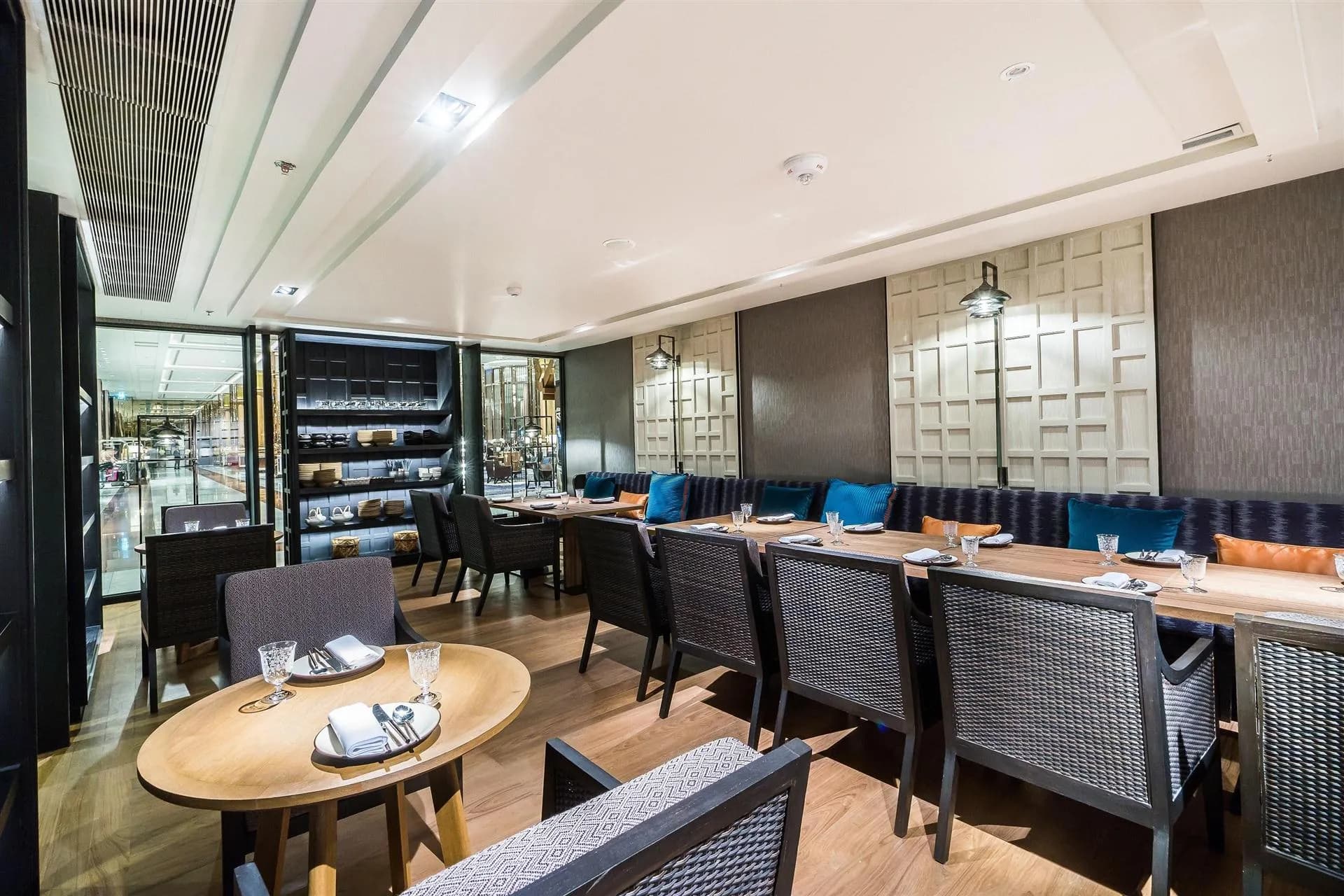 Contemporary restaurant dining interior in the evening at Bangkok Marriott Marquis Queen's Park