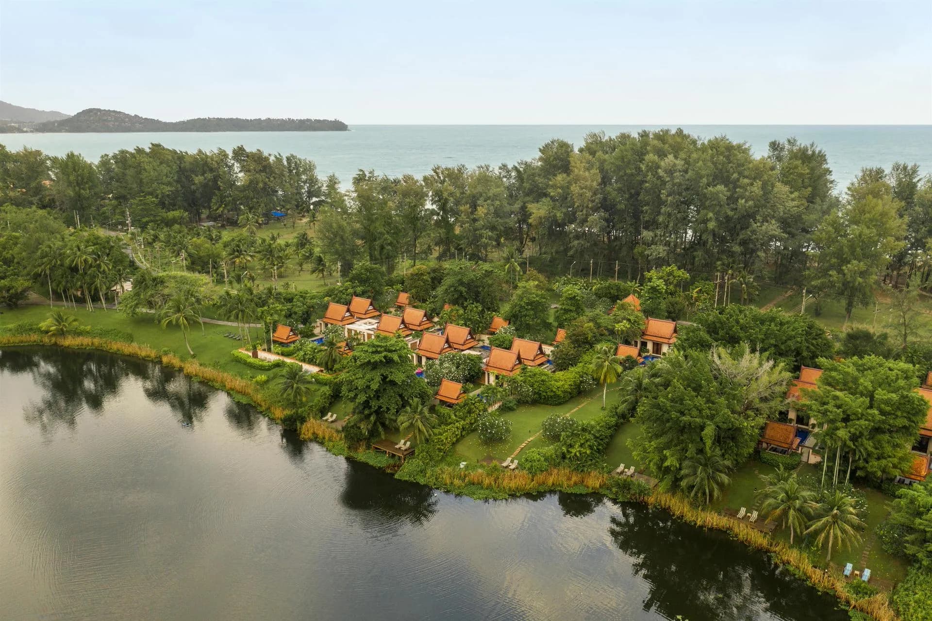 Lagoon-side lawn ceremony setting for a mandap at Banyan Tree Phuket, Thailand