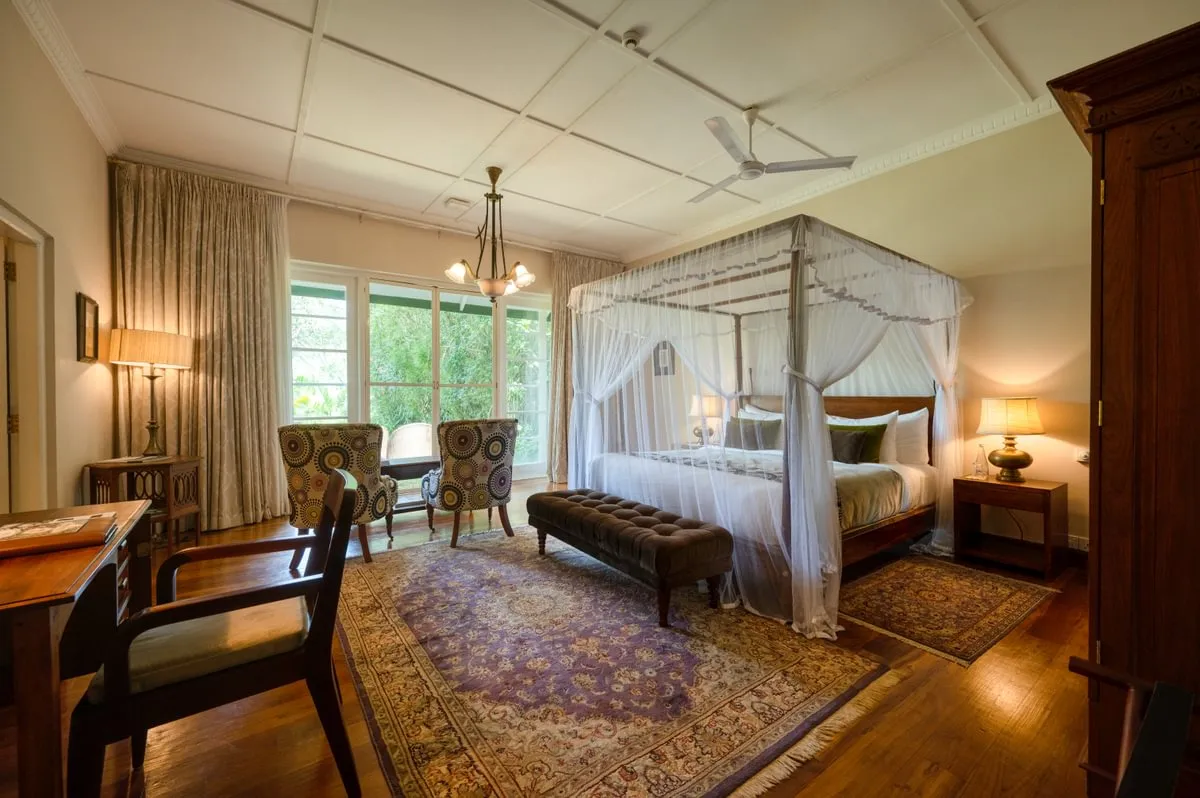 Garden suite and verandah set for intimate dining at Ceylon Tea Trails Sri Lanka