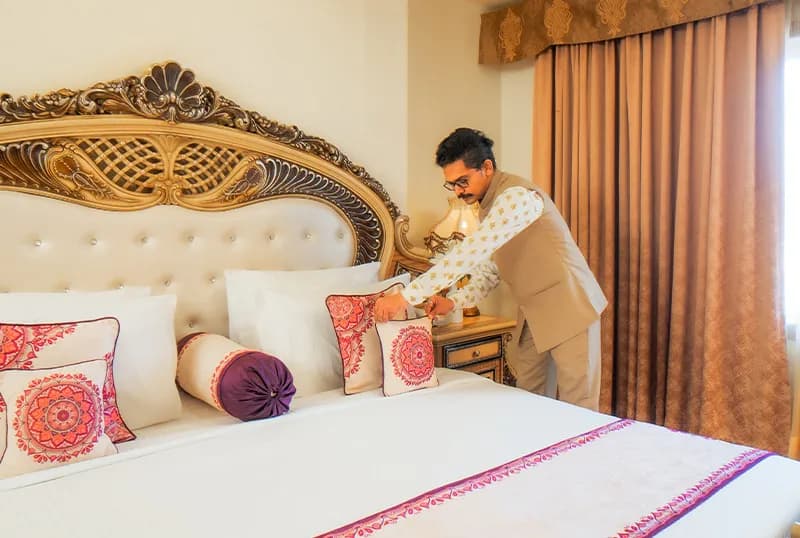 Traditional Rajasthani theming and sandstone architectural detail at Chokhi Dhani The Palace Hotel