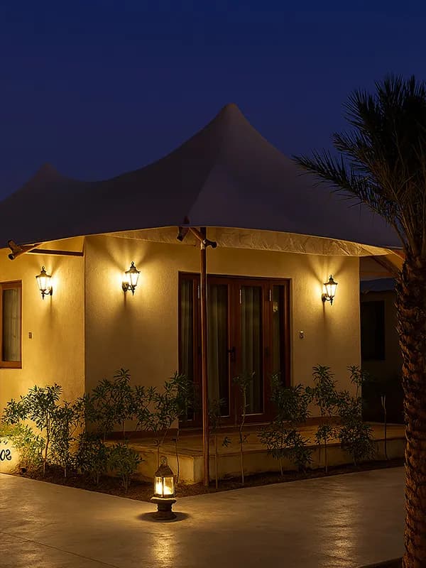 Event lawns and themed palace facade of Chokhi Dhani The Palace Hotel at the edge of the Thar desert, Jaisalmer