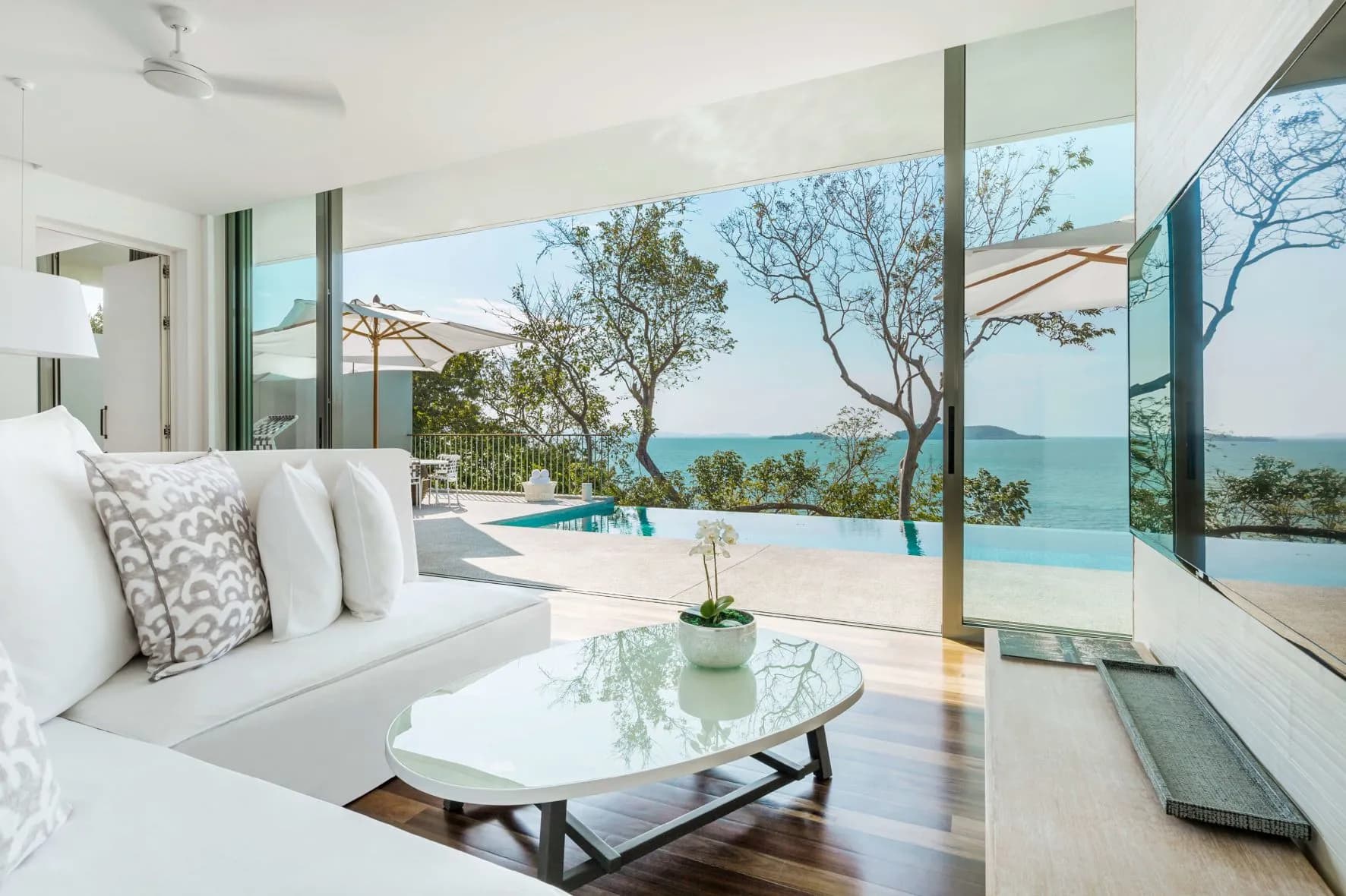 COMO Point Yamu Phuket headland and clifftop pool above Phang Nga Bay at golden hour
