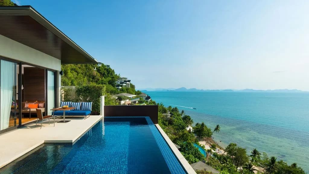 Premium ocean pool villa with a sunset view across the Gulf of Thailand at Conrad Koh Samui