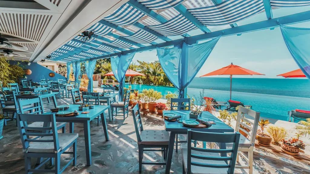 Azure clifftop restaurant and bar with ocean views at Conrad Koh Samui