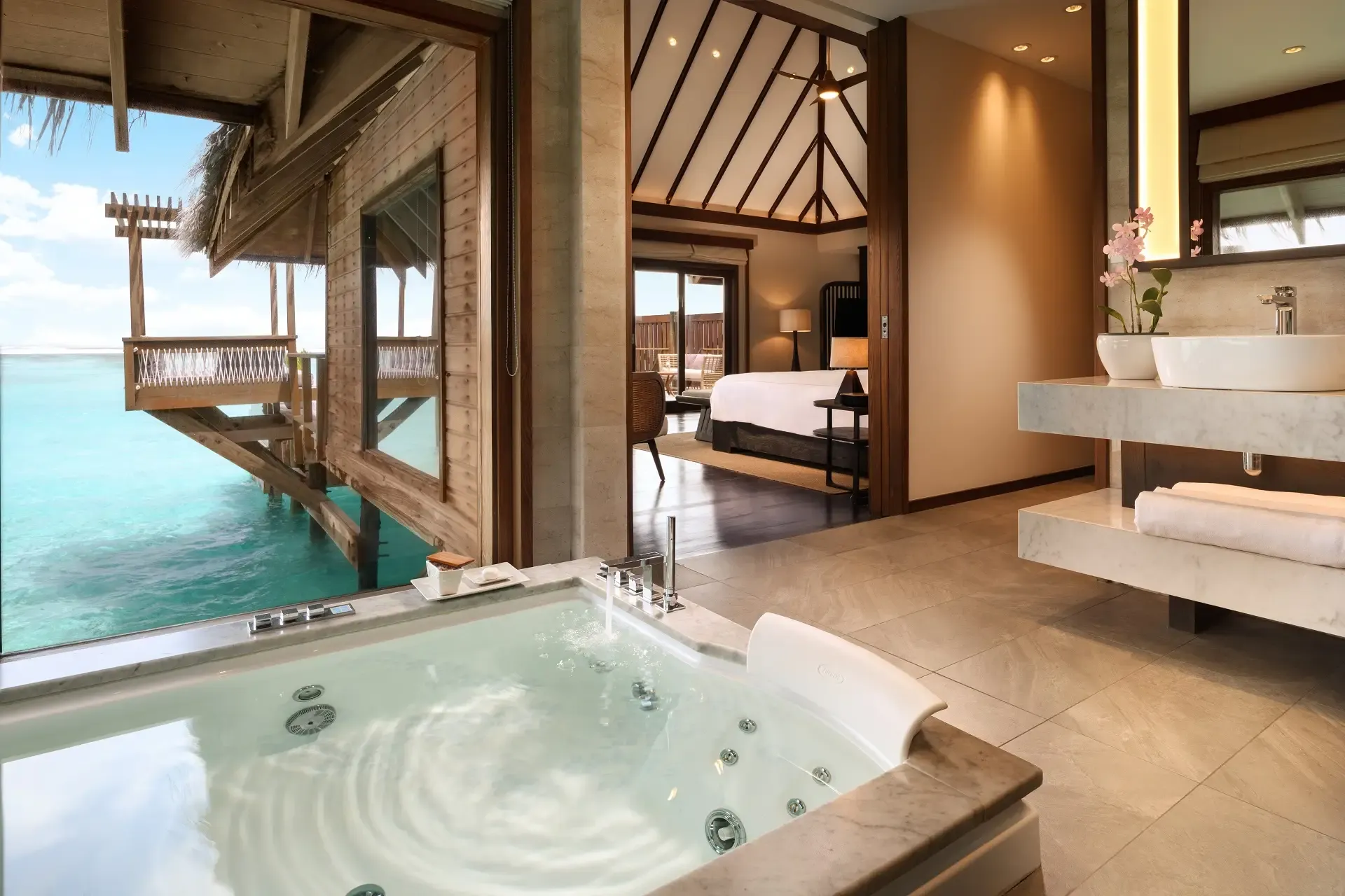 Premier over-water villa with ocean-view bathtub at Conrad Maldives Rangali Island