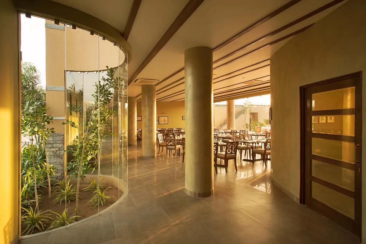 Dera Masuda pool deck and the Aravalli ranges at golden hour, Pushkar