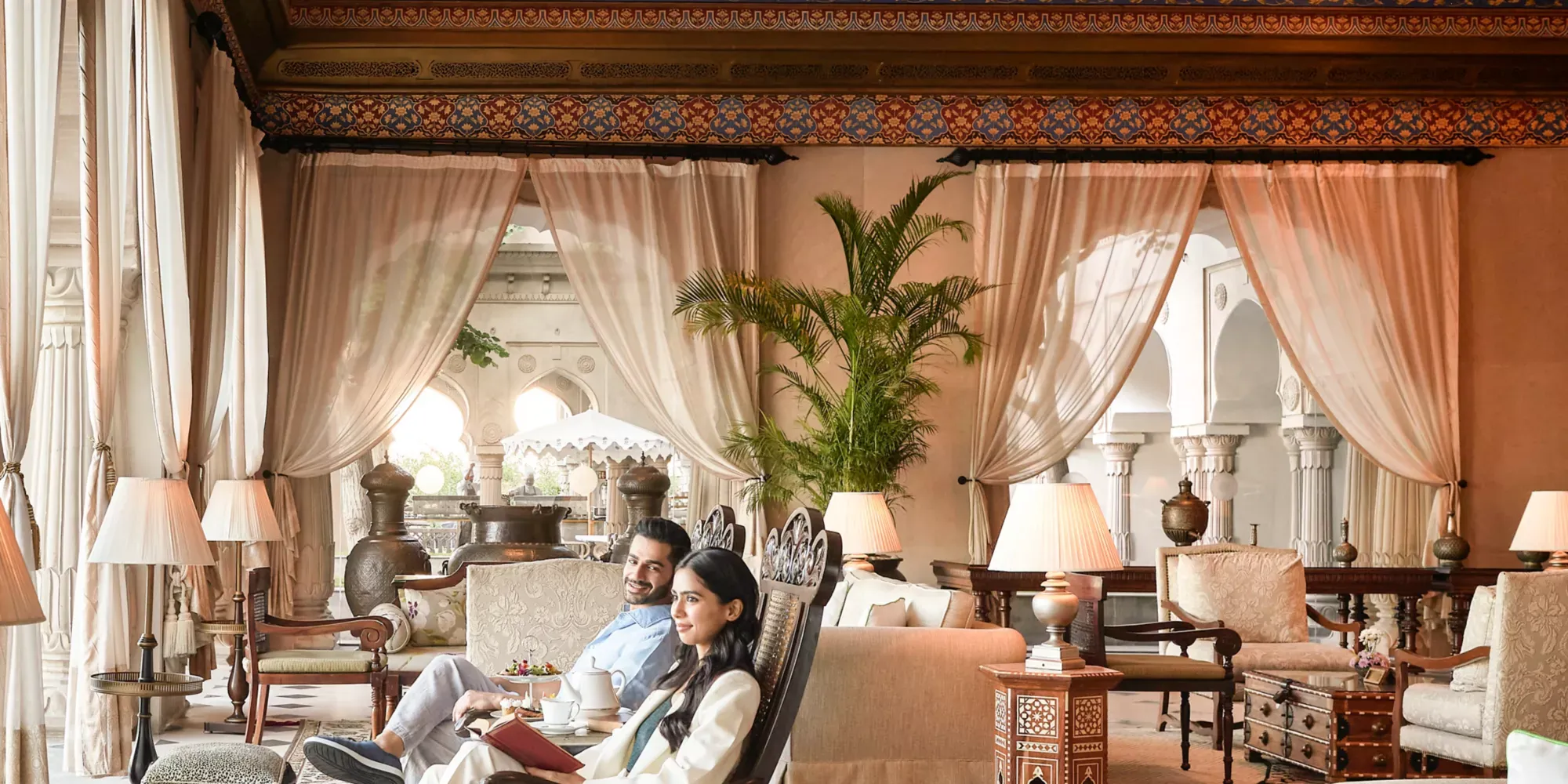 Grand Ballroom reception setup under crystal chandeliers at Fairmont Jaipur
