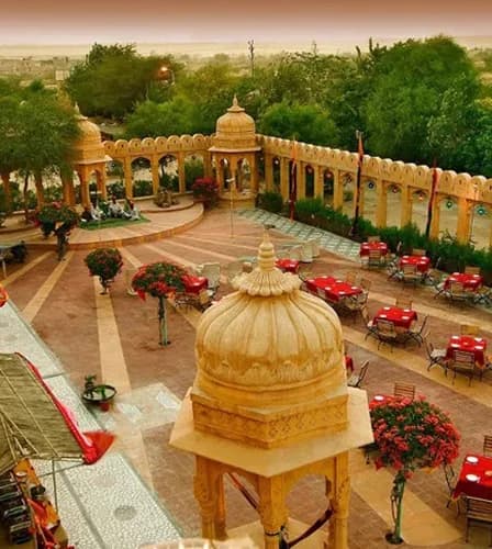 Sandstone courtyard daytime ceremony and mandap setting at Fort Rajwada Jaisalmer