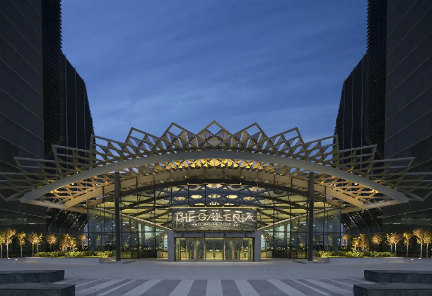 The Galleria Al Maryah Island illuminated entrance canopy beside the Four Seasons Abu Dhabi