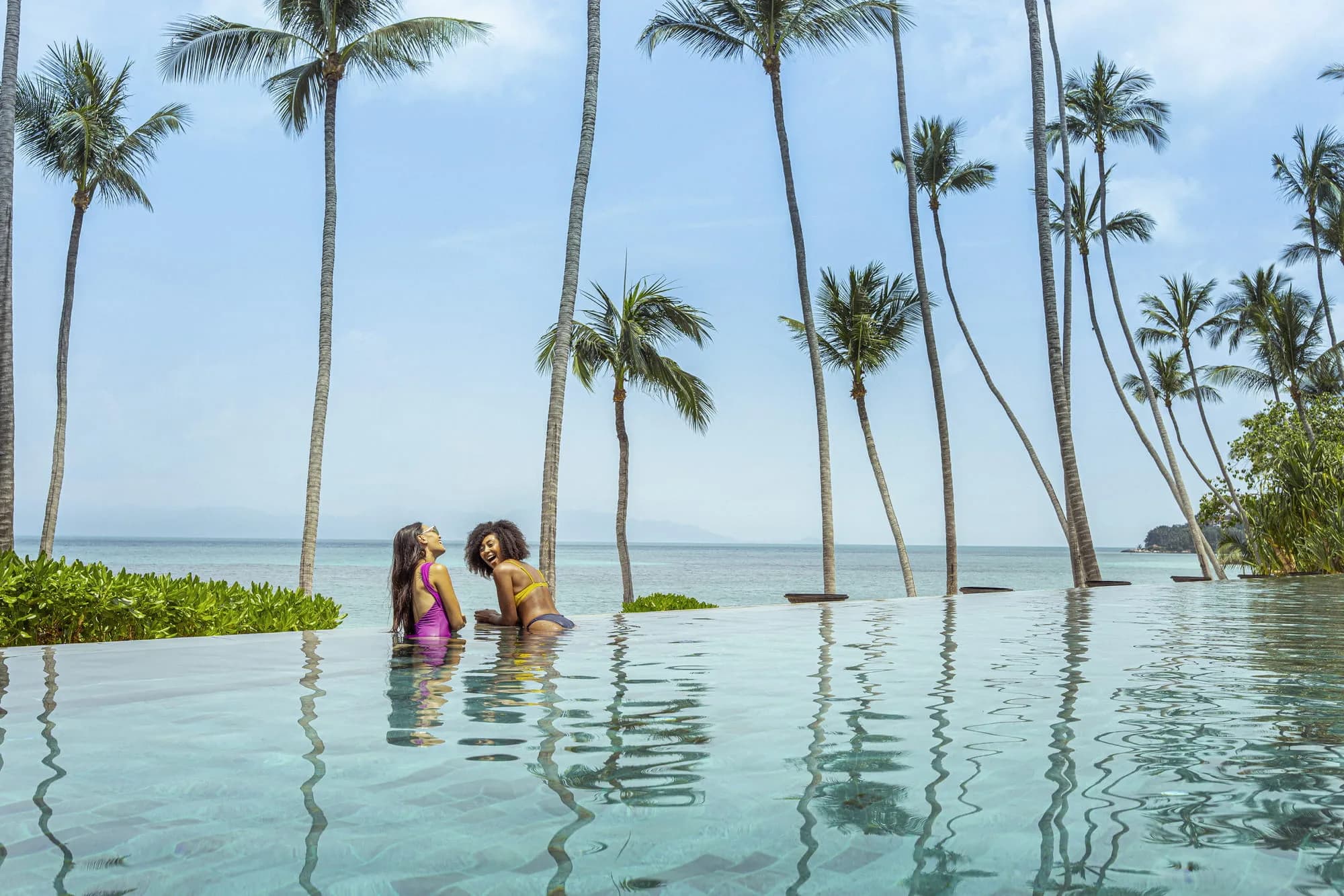 Four Seasons Resort Koh Samui evening wedding reception celebration on the ocean-view lawn above the Gulf of Thailand