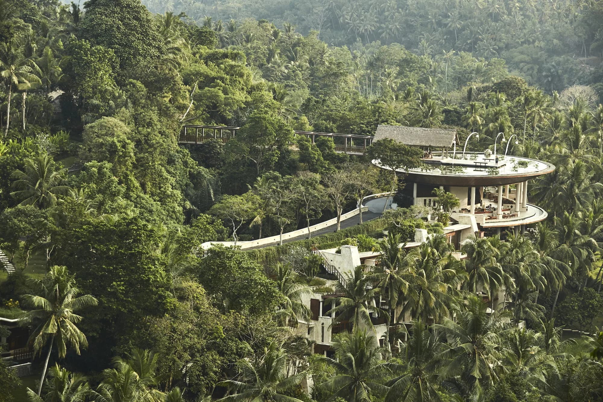 Poolside reception dinner setup beside the Ayung River at Four Seasons Resort Bali at Sayan Ubud Bali
