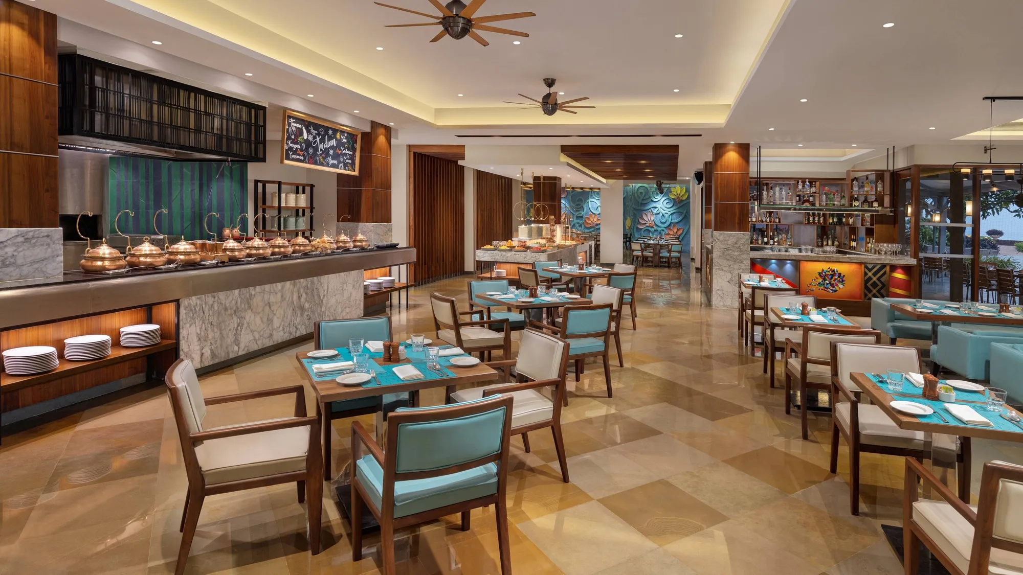 Waterfront terrace and bar detail at Goa Marriott Resort and Spa, Miramar