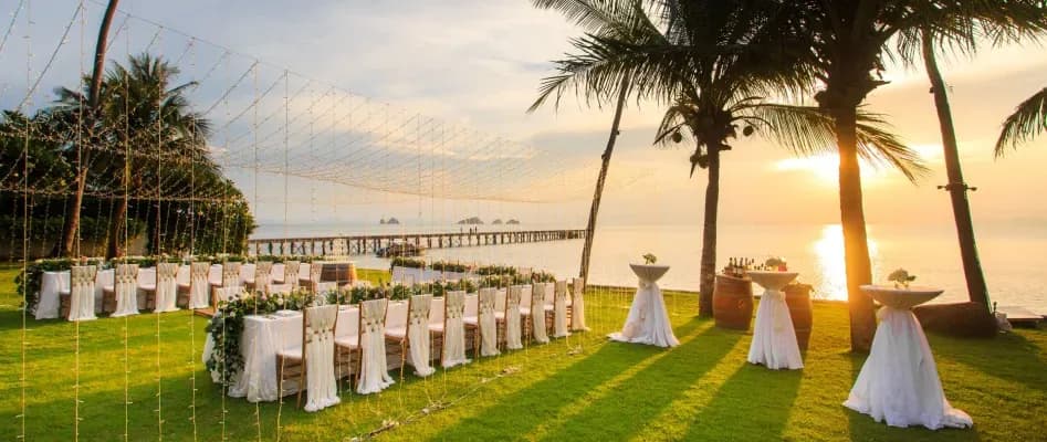 The beachfront lawn wedding setting at InterContinental Koh Samui Resort overlooking the sea