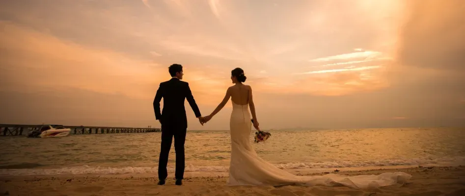 Honeymoon and vow-renewal celebration setting by the water at InterContinental Koh Samui Resort