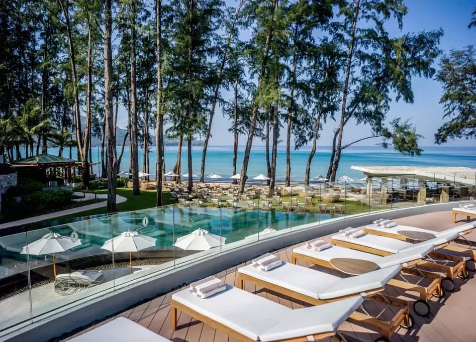 Aerial overview of InterContinental Phuket Resort grounds and pools above Kamala Beach, Phuket