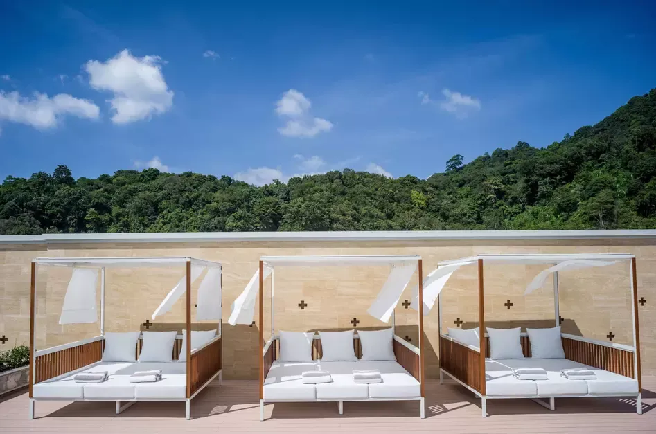 Tiered infinity and lagoon pools facing the Andaman Sea at InterContinental Phuket Resort