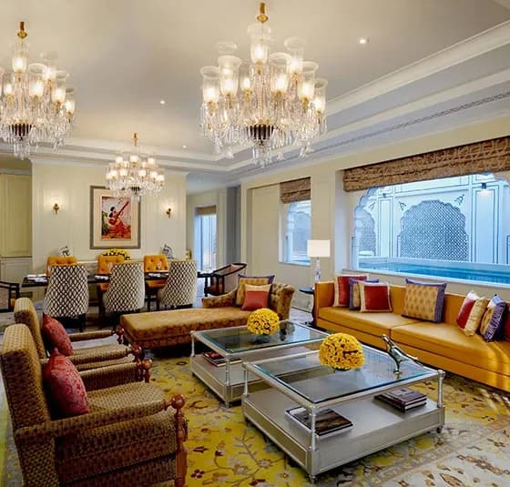 Open verandahs and courtyard with views toward Amer Fort at The Leela Palace Jaipur