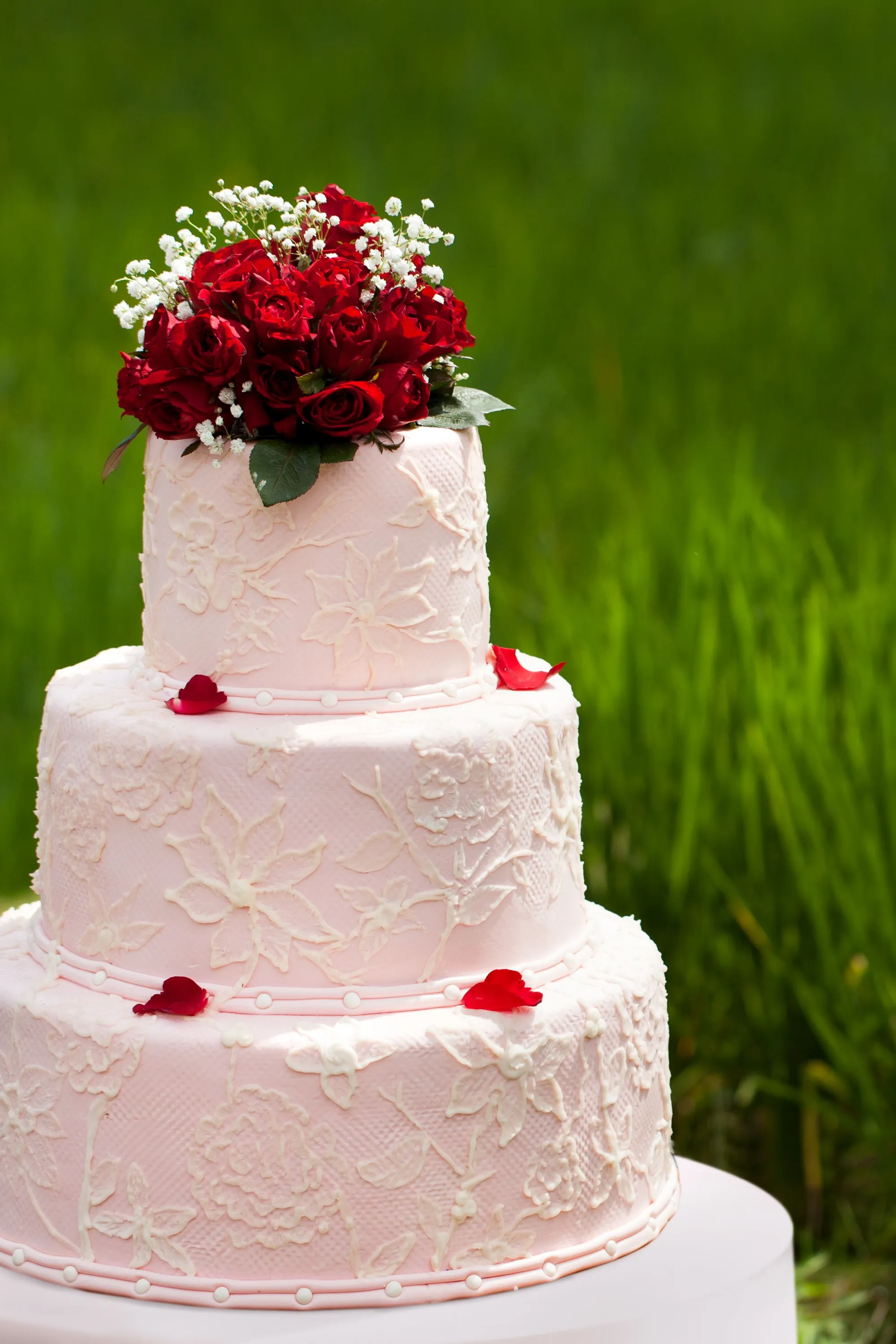 Tiered wedding cake and decor detail at Mandapa a Ritz-Carlton Reserve Ubud Bali