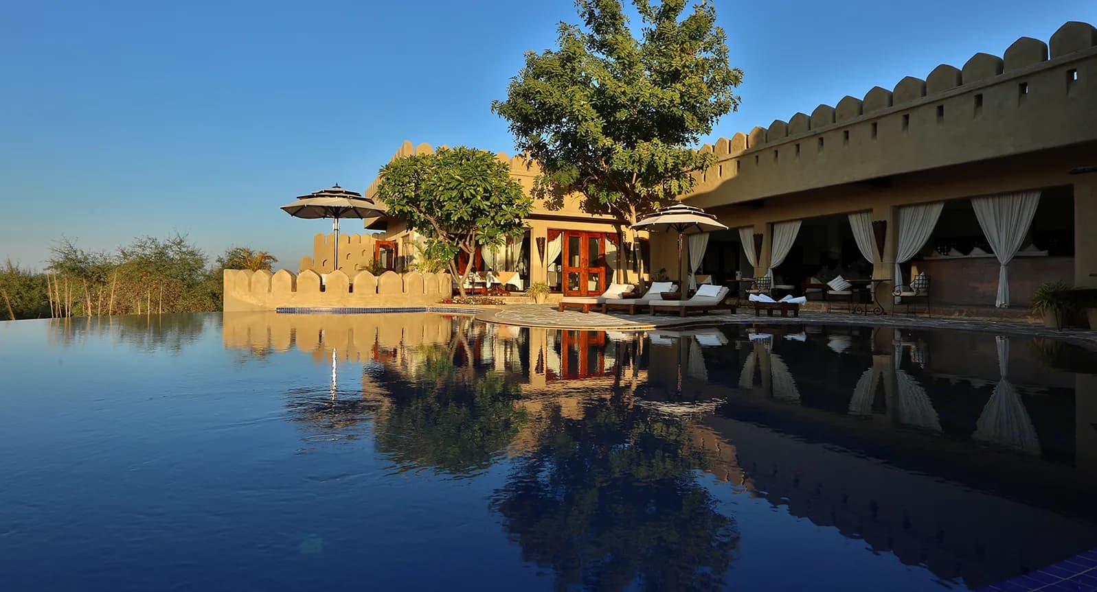 Traditional Marwar mud-craft, wattle and earthy interior design detail at Mihir Garh near Jodhpur