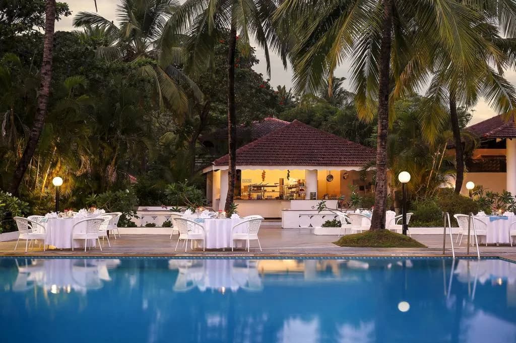 Poolside and garden courtyard at Novotel Goa Dona Sylvia Resort, South Goa