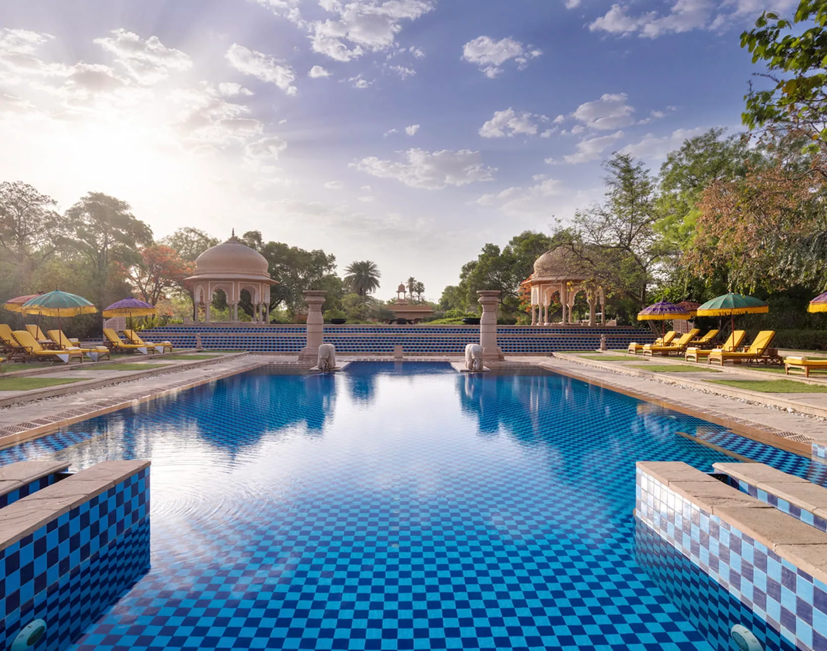 Marble courtyard and elephant-fountain swimming pool at The Oberoi Rajvilas Jaipur