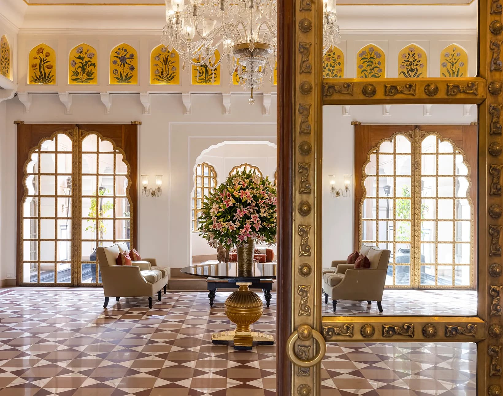 Traditional Rajput jaali screen, fresco and marble design detail at The Oberoi Rajvilas Jaipur