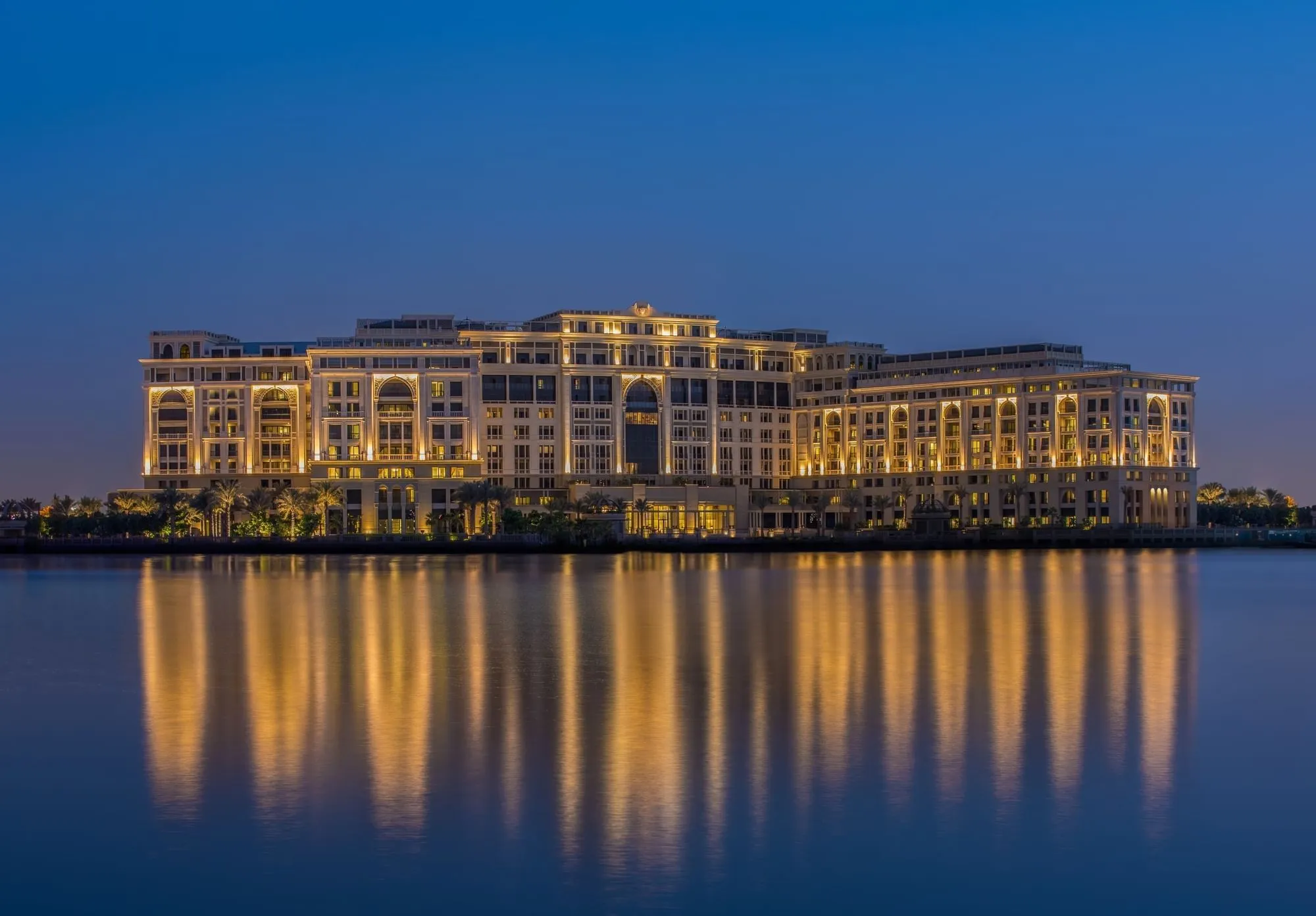 Palazzo Versace Dubai illuminated façade on Jaddaf Waterfront at night