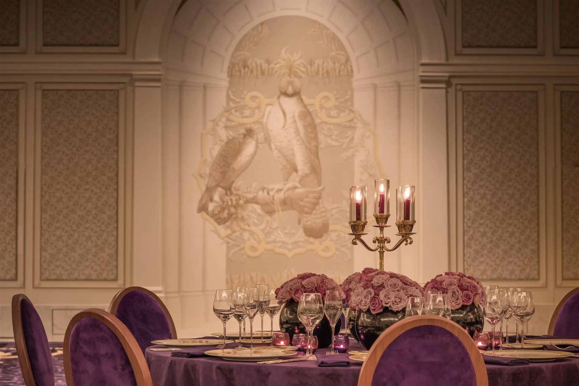 Gala Ballroom reception dining setup under chandeliers at Palazzo Versace Dubai
