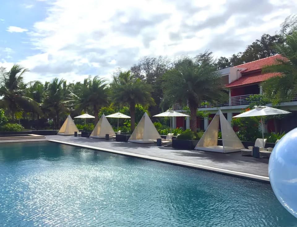 Swimming pool and poolside area at Planet Hollywood Beach Resort Goa