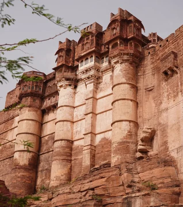 Central sandstone courtyard and heated pool at RAAS Jodhpur