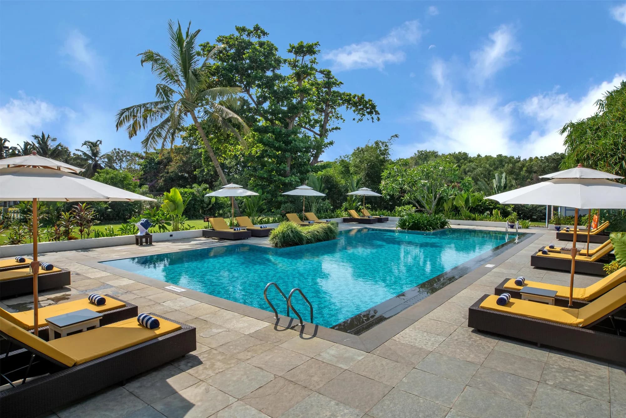 Free-form pool and courtyard at Radisson Blu Resort Goa Cavelossim Beach