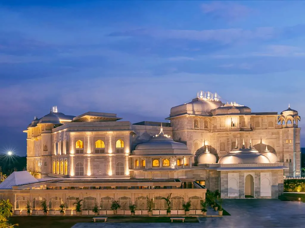 Exterior of Raffles Jaipur palace-style hotel framed by the Aravalli Hills near Amer, Jaipur