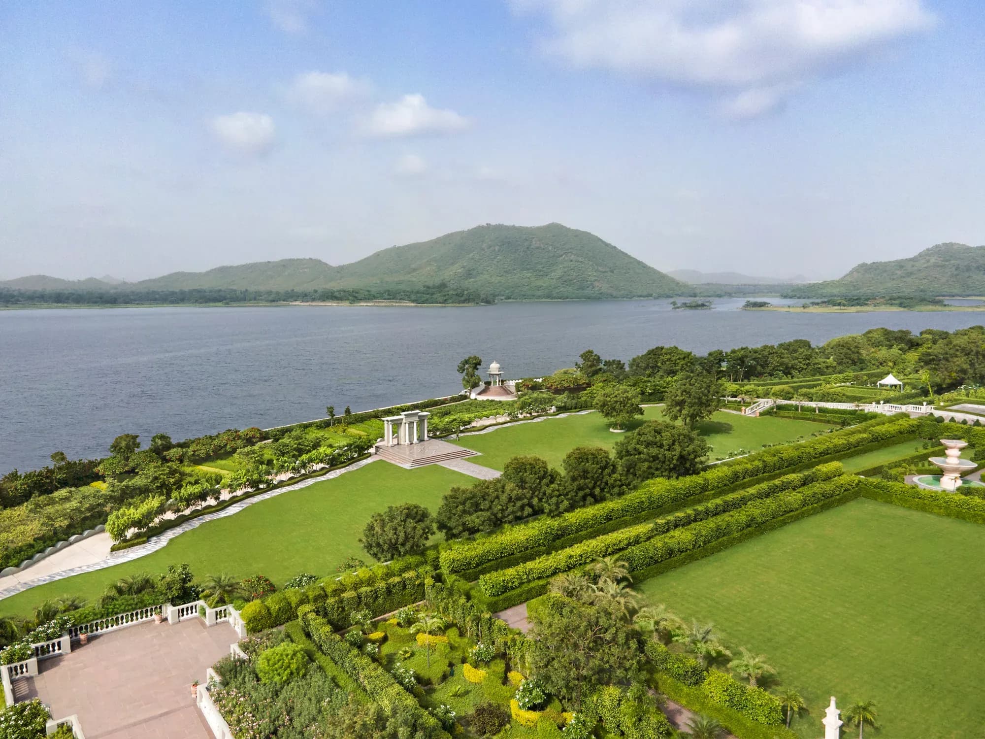 Garden temple ceremony setting overlooking Udai Sagar Lake at Raffles Udaipur