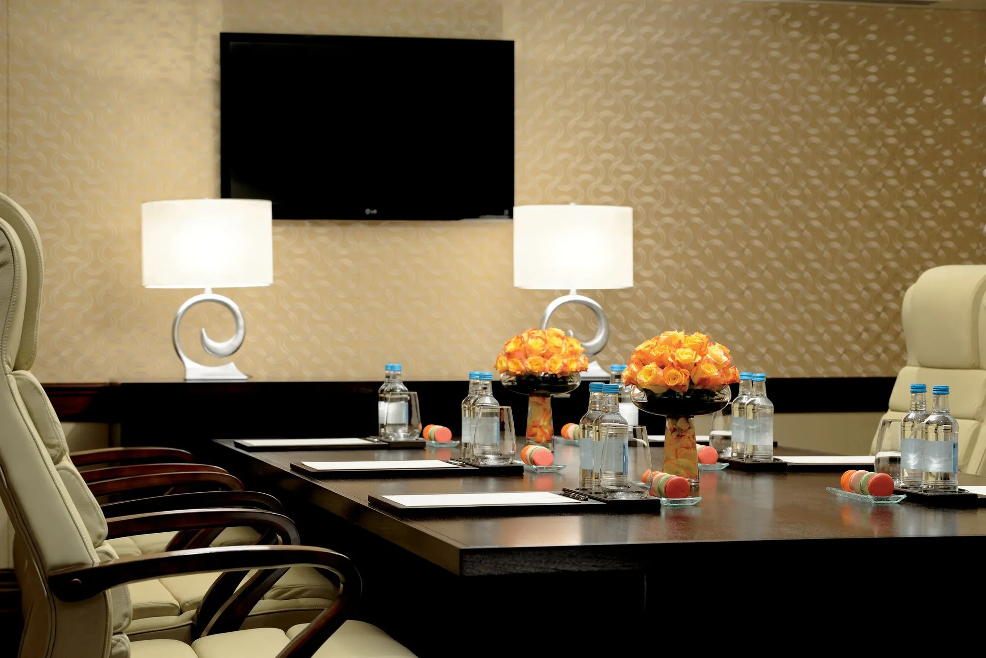 Grand reception salon with crystal chandelier and seating at The Ritz-Carlton Abu Dhabi Grand Canal