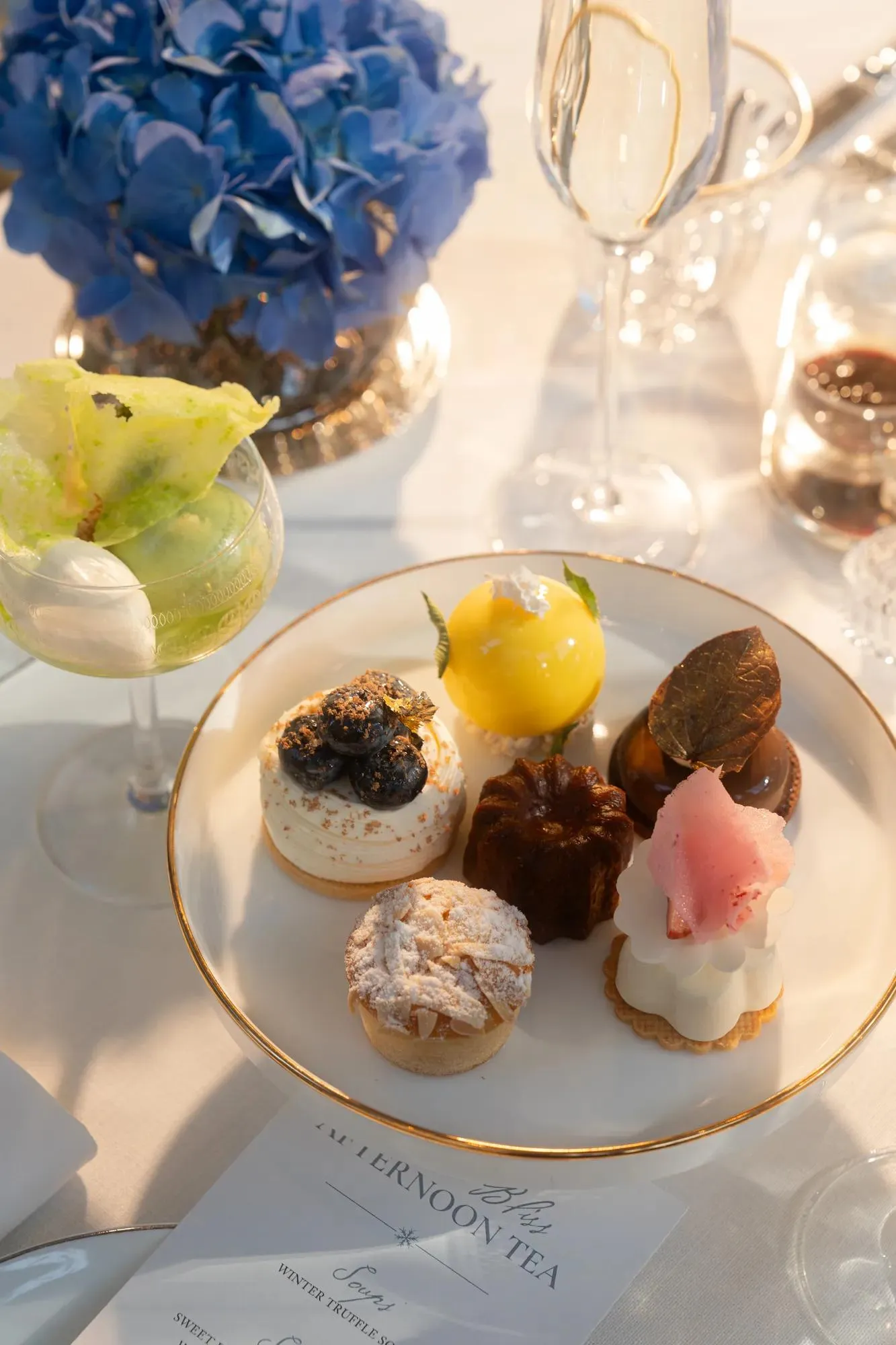 Afternoon tea presentation in an elegant lounge at Rosewood Bangkok