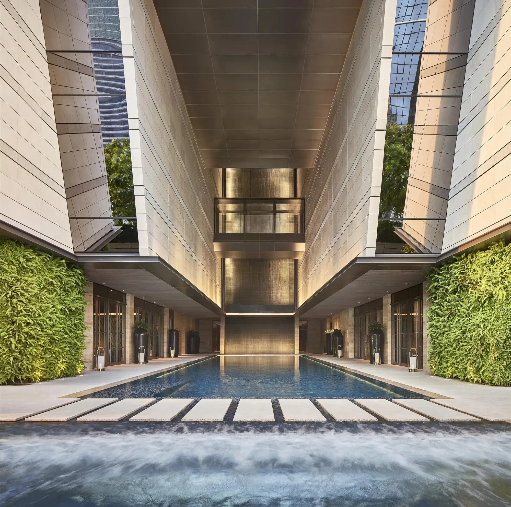 Rooftop wellness swimming pool deck at Rosewood Bangkok city-luxury hotel