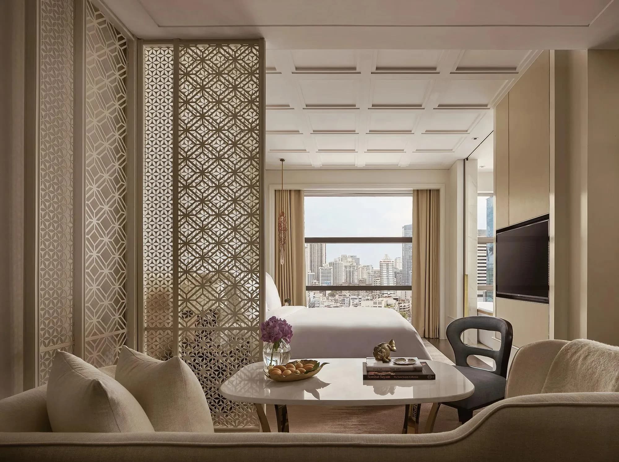 Executive room contemporary living space with Bangkok city views at Rosewood Bangkok