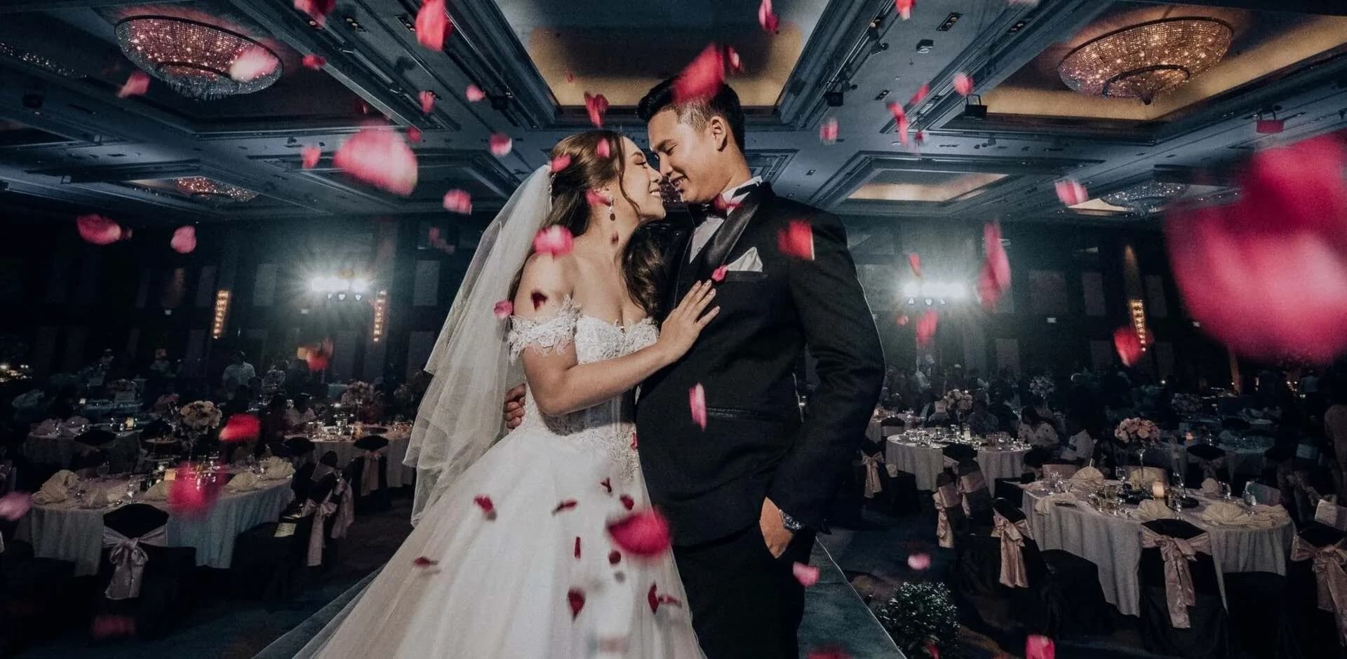 Grand Ballroom wedding reception with chandeliers at Shangri-La Bangkok