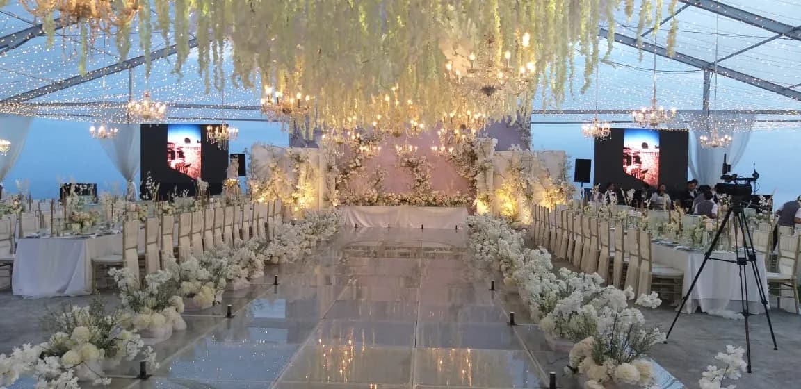 Floating-stage clifftop ceremony and celebration setting at Six Senses Uluwatu Bali