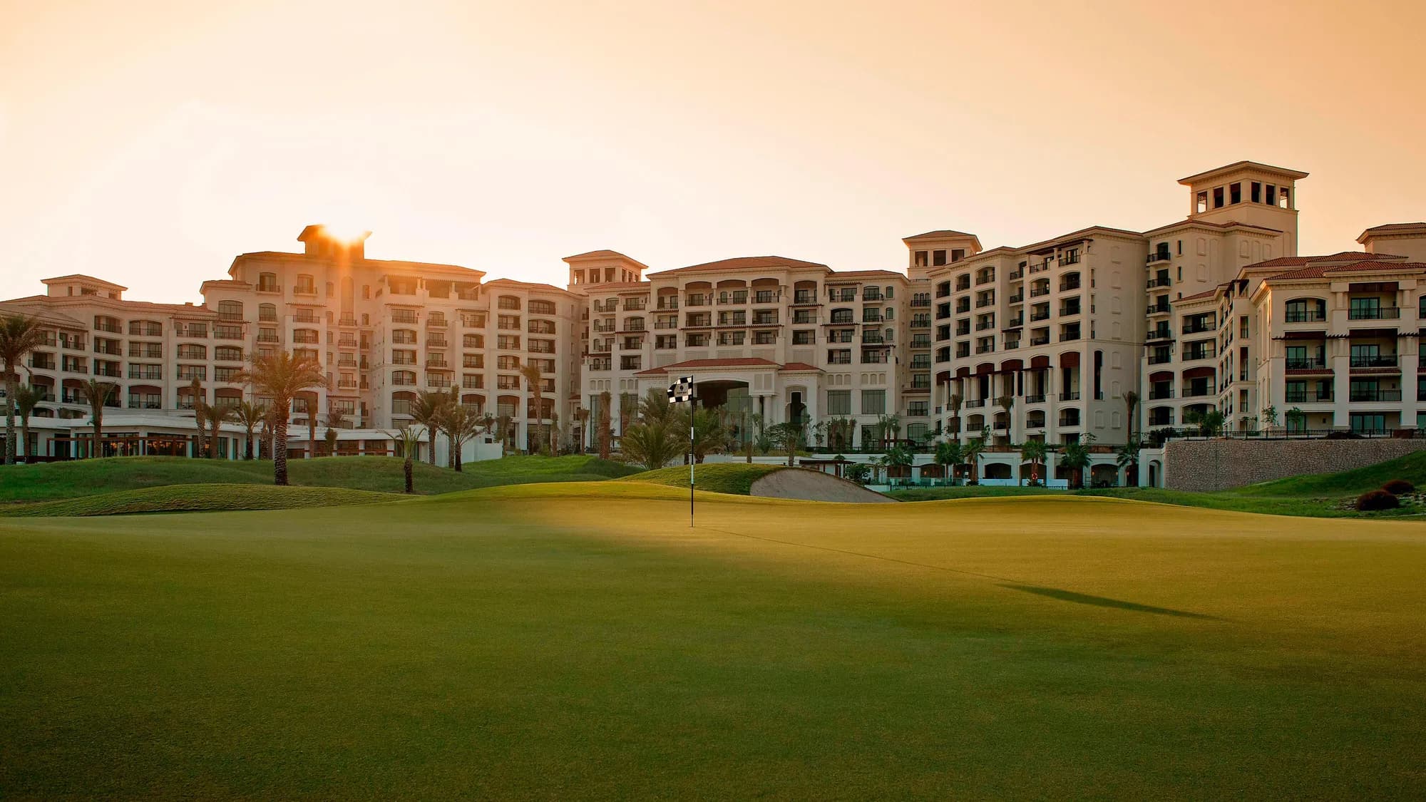 Mediterranean-style architecture of The St. Regis Saadiyat Island Resort above the white-sand beach and Arabian Gulf, Abu Dhabi