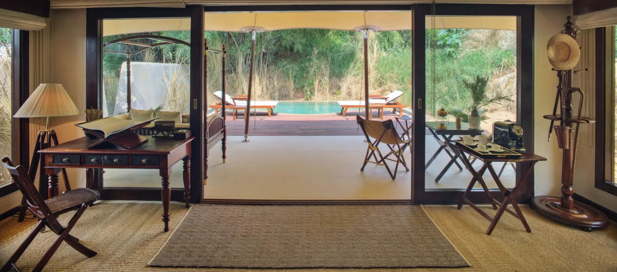 1920s-inspired luxury tented suite interior with antique furniture at SUJÁN Sher Bagh Ranthambore