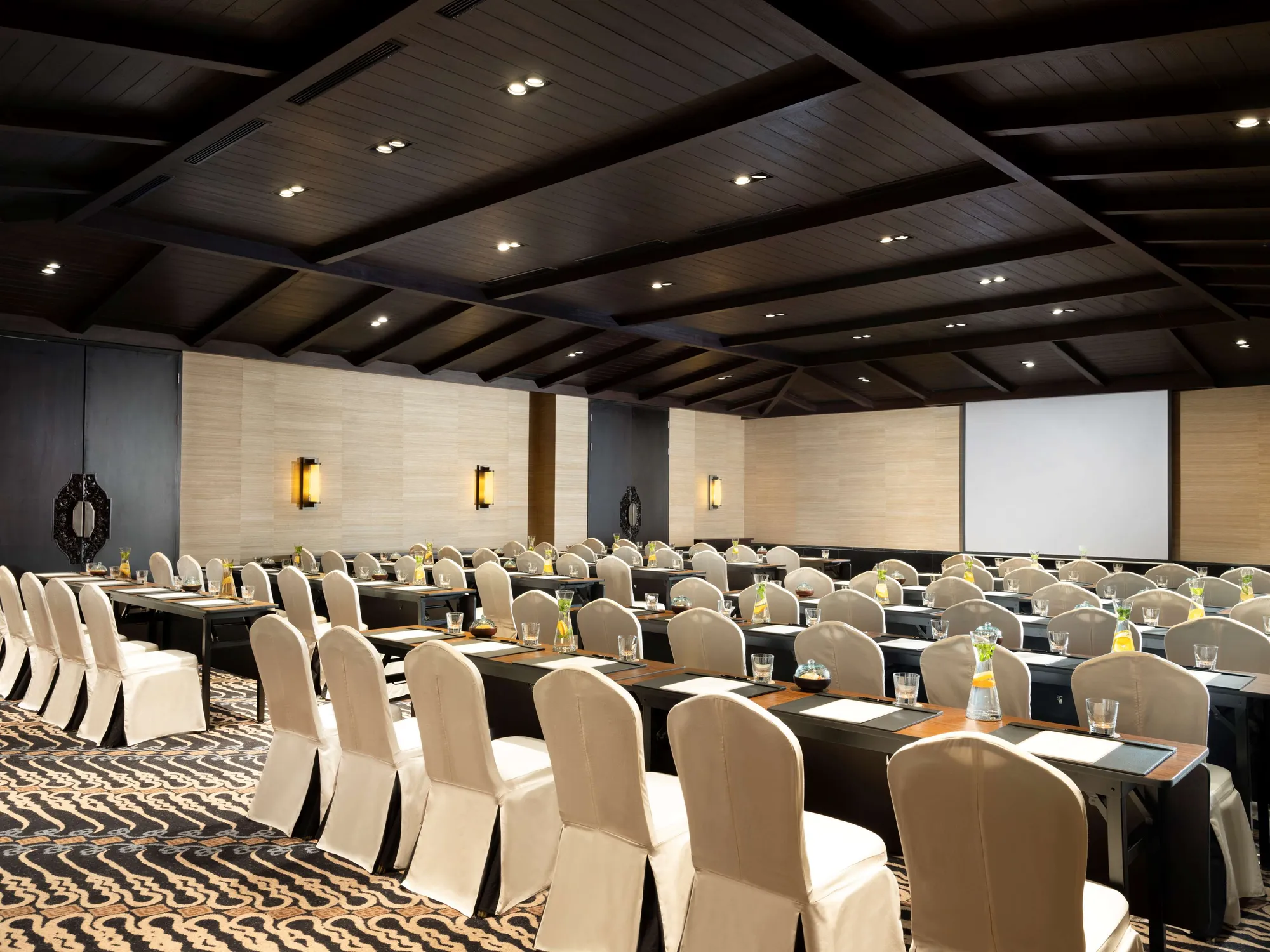 Indoor event space set up for a celebration dinner at The Apurva Kempinski Bali, Bali